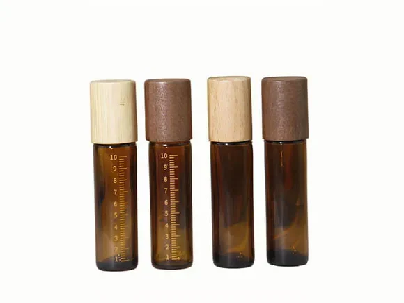 Amber Glass Roll On Bottles with Wooden Lids — main view