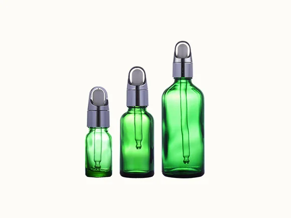 Green Cylindrical Glass Essential Oil Bottle — main view