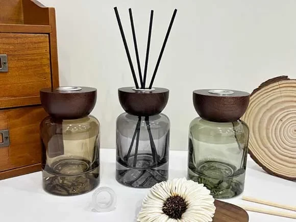 () Round Glass Diffuser Bottles with Wooden Lids — main view