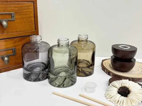 () Round Glass Diffuser Bottles with Wooden Lids — view 2