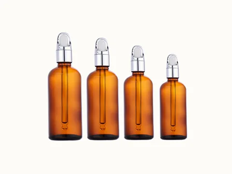 Brown Cylindrical Glass Essential Oil Bottle
