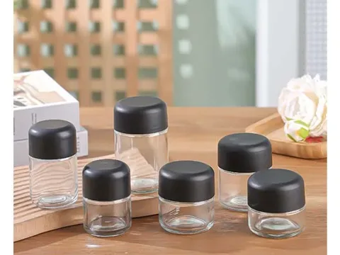 () () () () Glass Cannabis Jars with Child — view 2