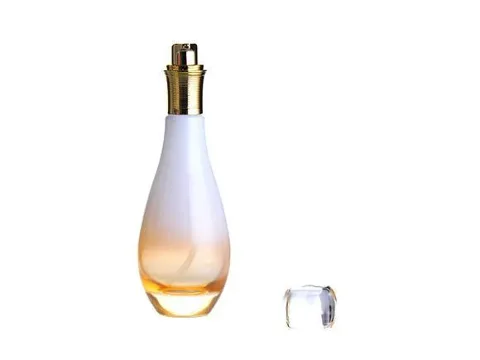 white and orange glass spray bottle — view 2
