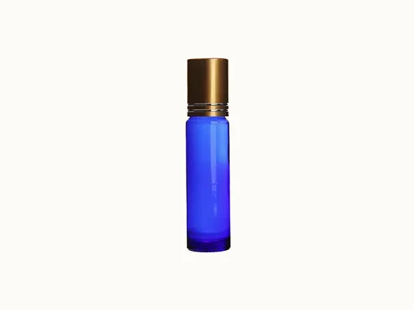 blue perfume/ essential oil round glass bottles with roller — main view