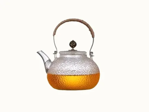 Clear Glass Tea Pot With Copper Handle