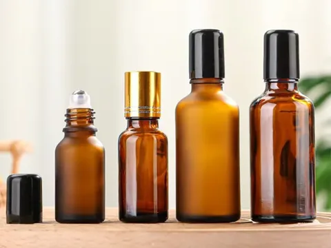 Amber Glass Roller Bottles With Lids — view 2