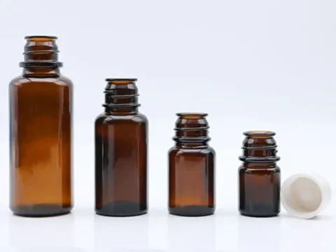 () () () Amber Pour-out Round Glass Bottles — view 3